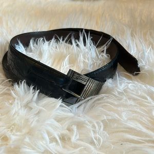 Black alligator men’s belt with silver buckle